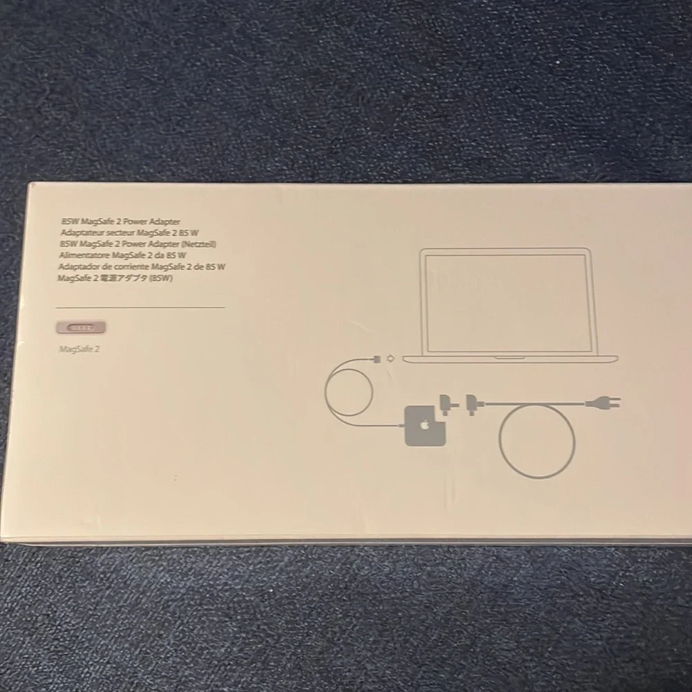 Brand new, unopened Apple 85 W MagSafe 2 Power Adapter.